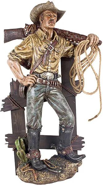 Estátua Cowboy na Cerca com Arma no Ombro