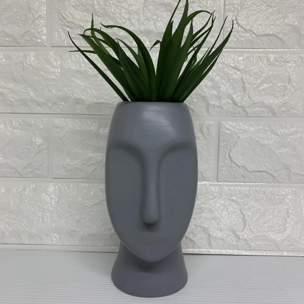 Vaso máscara cinza com planta artificial