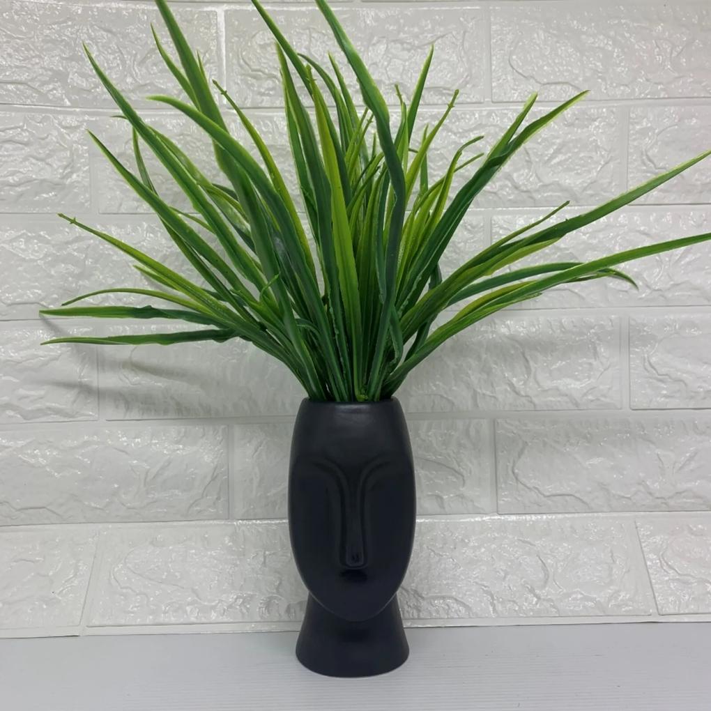 Vaso máscara preto com planta artificial